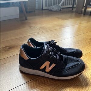 New Balance Men's Black Sneakers with Gold Accents